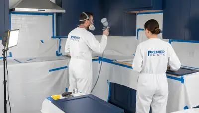 Professional cabinet painting in Boulder CO kitchen with smooth durable refinished wood surfaces